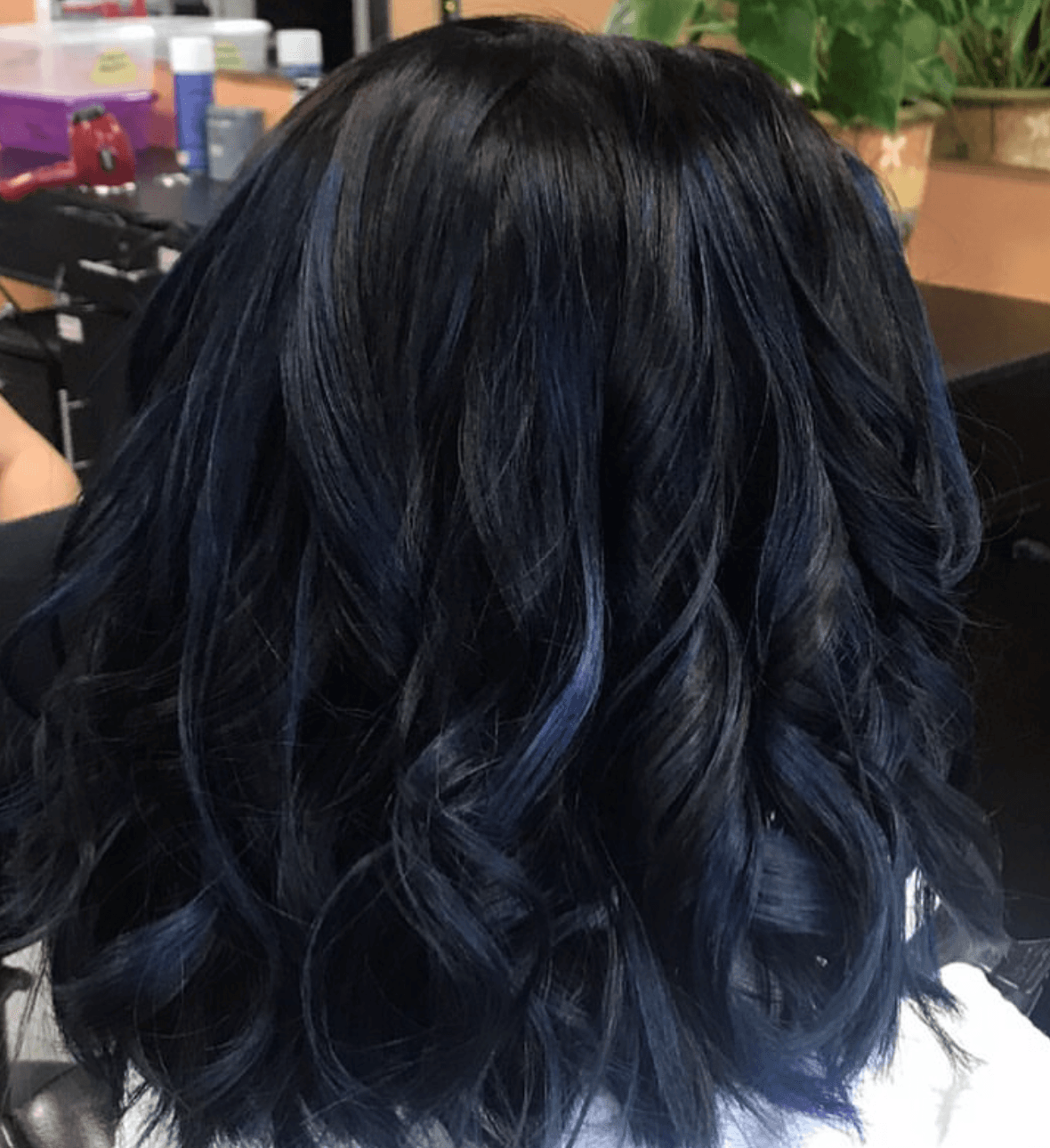 Dark blue black wavy shoulder-length hairstyle
