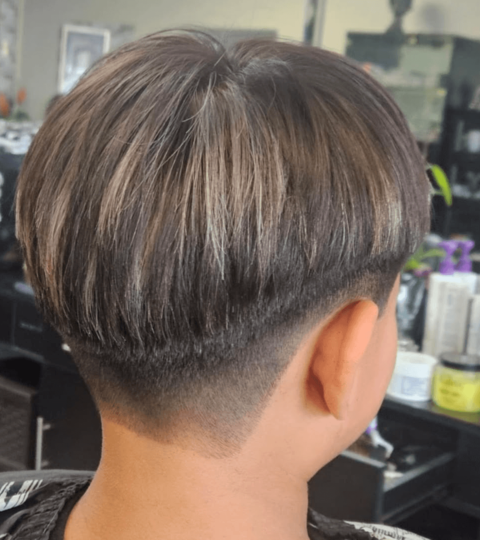 Textured crop haircut with a clean taper fade